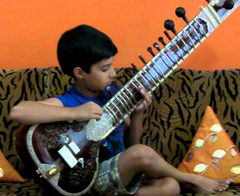 Kid with sitar