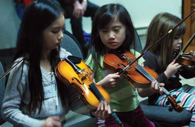 kids playing violin