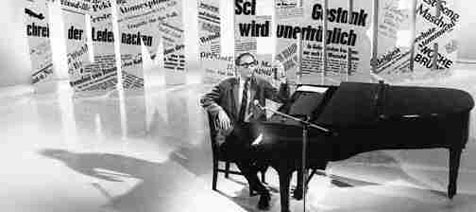 Tom Lehrer at the piano - publicity shot.